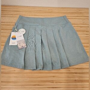 Vuori Halo Performance Skirt in Celery Heather